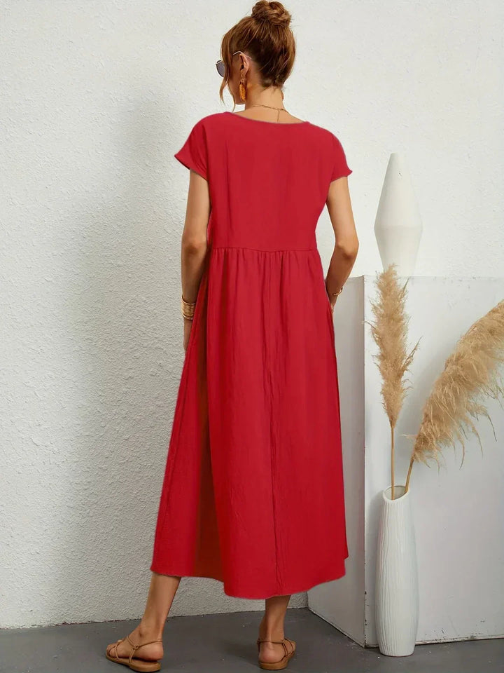 Lucyna - Midi sukienka w płynnej elegancji ponadczasowej