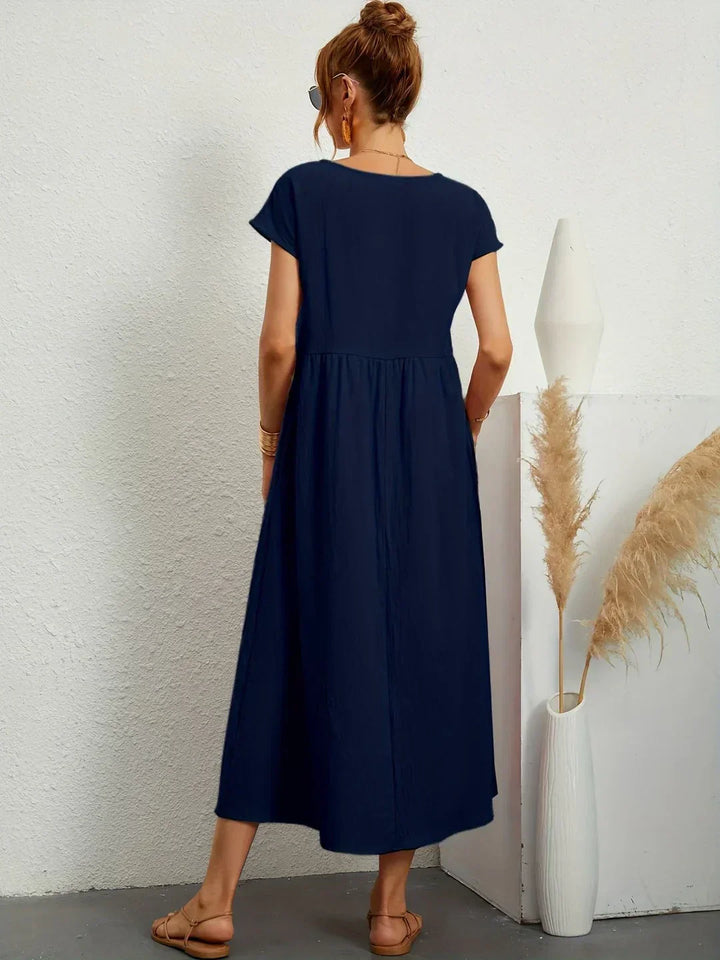 Lucyna - Midi sukienka w płynnej elegancji ponadczasowej