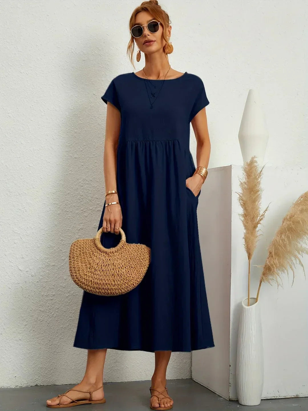 Lucyna - Midi sukienka w płynnej elegancji ponadczasowej
