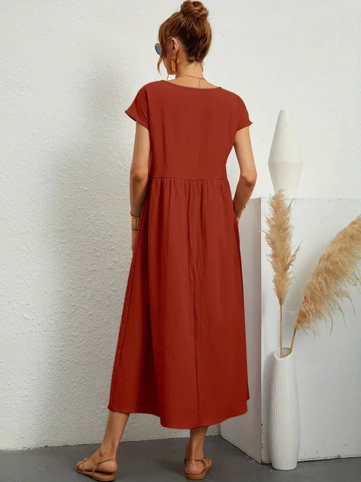Lucyna - Midi sukienka w płynnej elegancji ponadczasowej