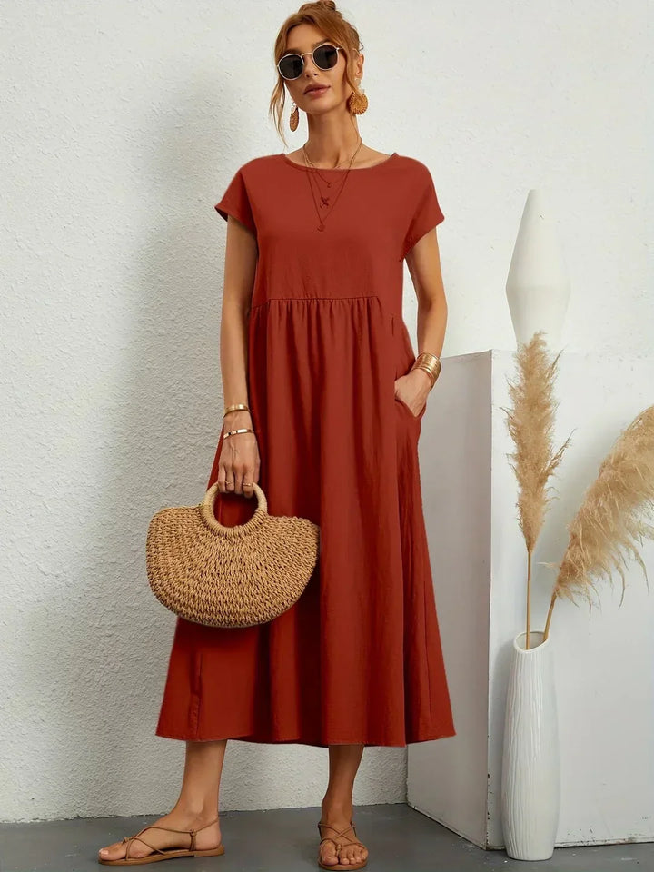 Lucyna - Midi sukienka w płynnej elegancji ponadczasowej