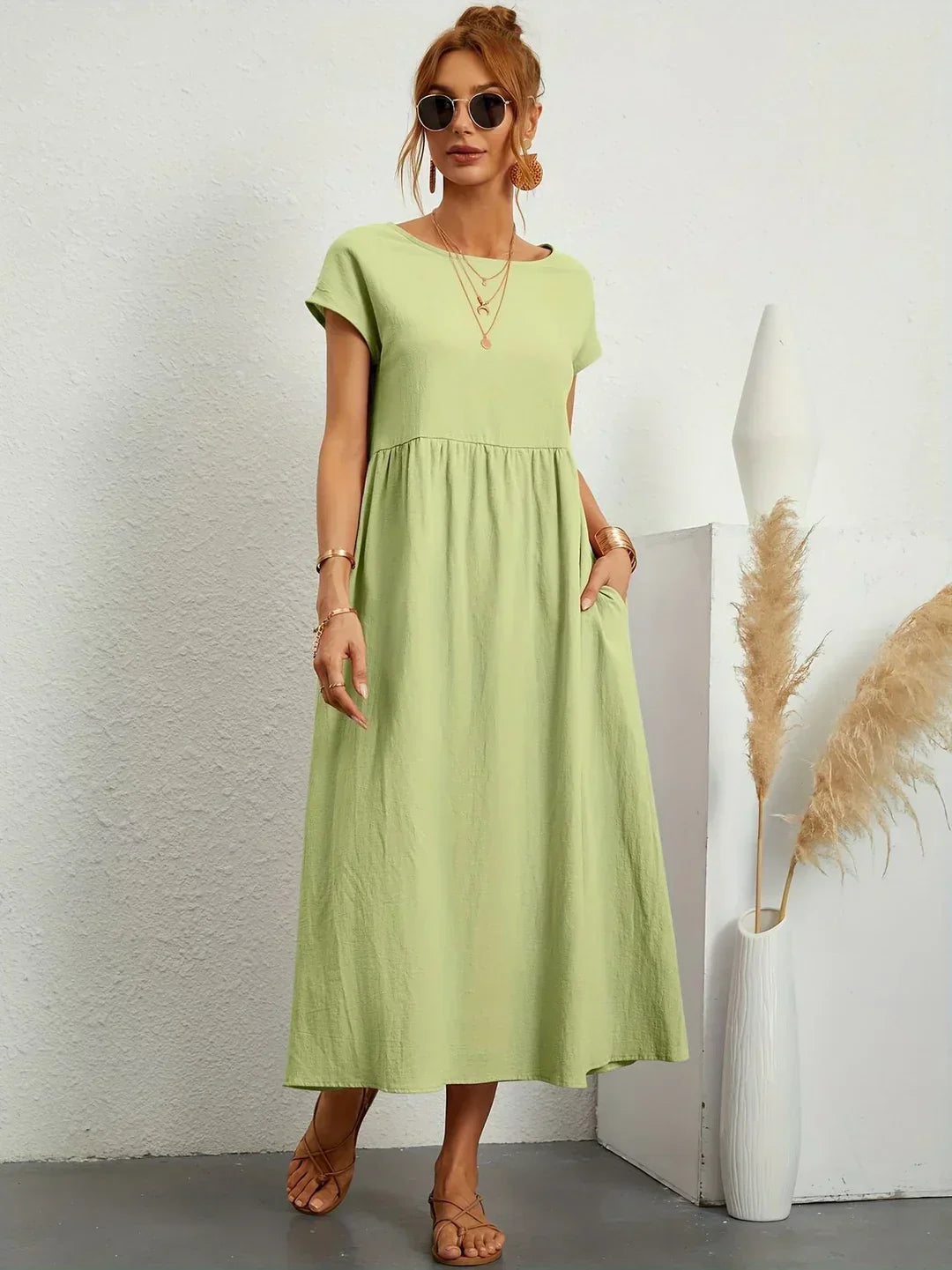 Lucyna - Midi sukienka w płynnej elegancji ponadczasowej