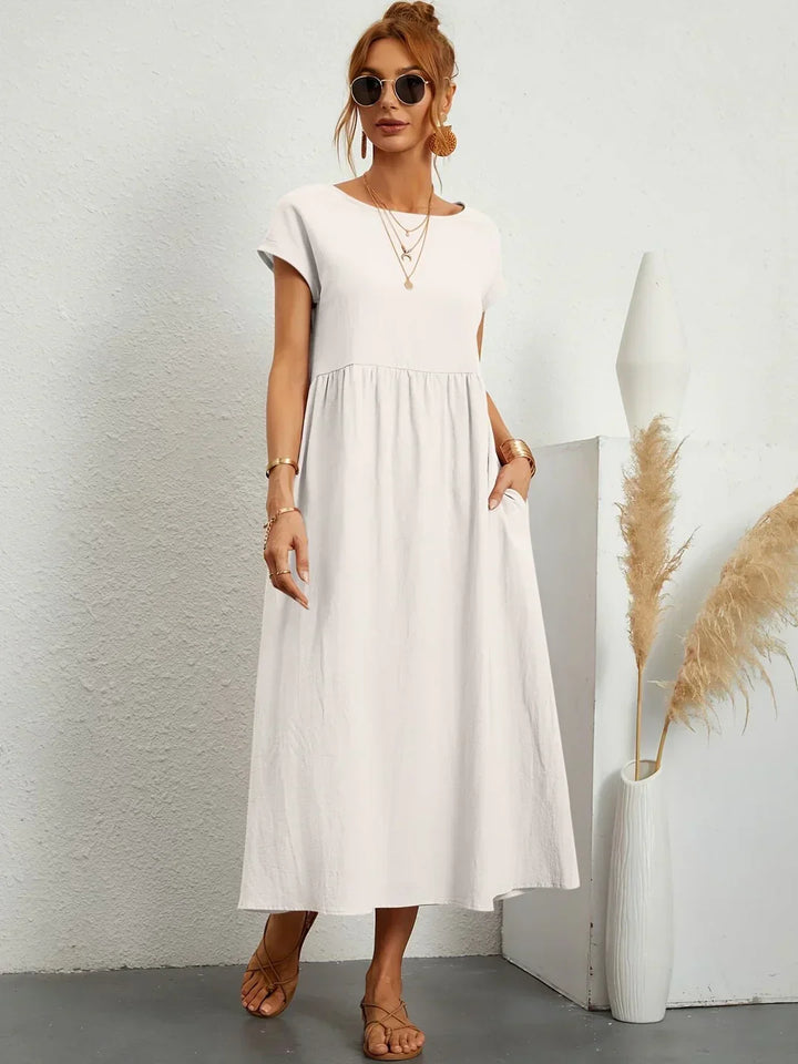 Lucyna - Midi sukienka w płynnej elegancji ponadczasowej