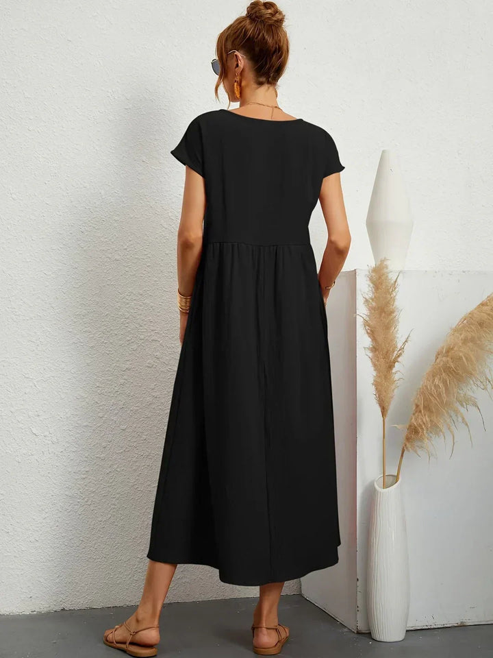 Lucyna - Midi sukienka w płynnej elegancji ponadczasowej